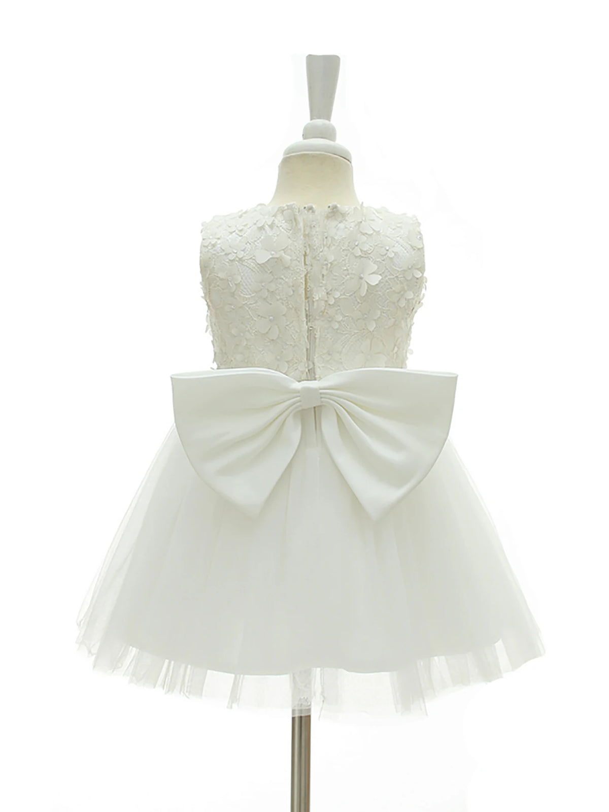 Back view of Adeline White Tulle Special Occasion Dress with bow accents, lace bodice, knee-length, sleeveless.