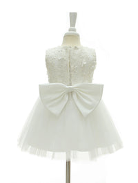 Back view of Adeline White Tulle Special Occasion Dress with bow accents, lace bodice, knee-length, sleeveless.