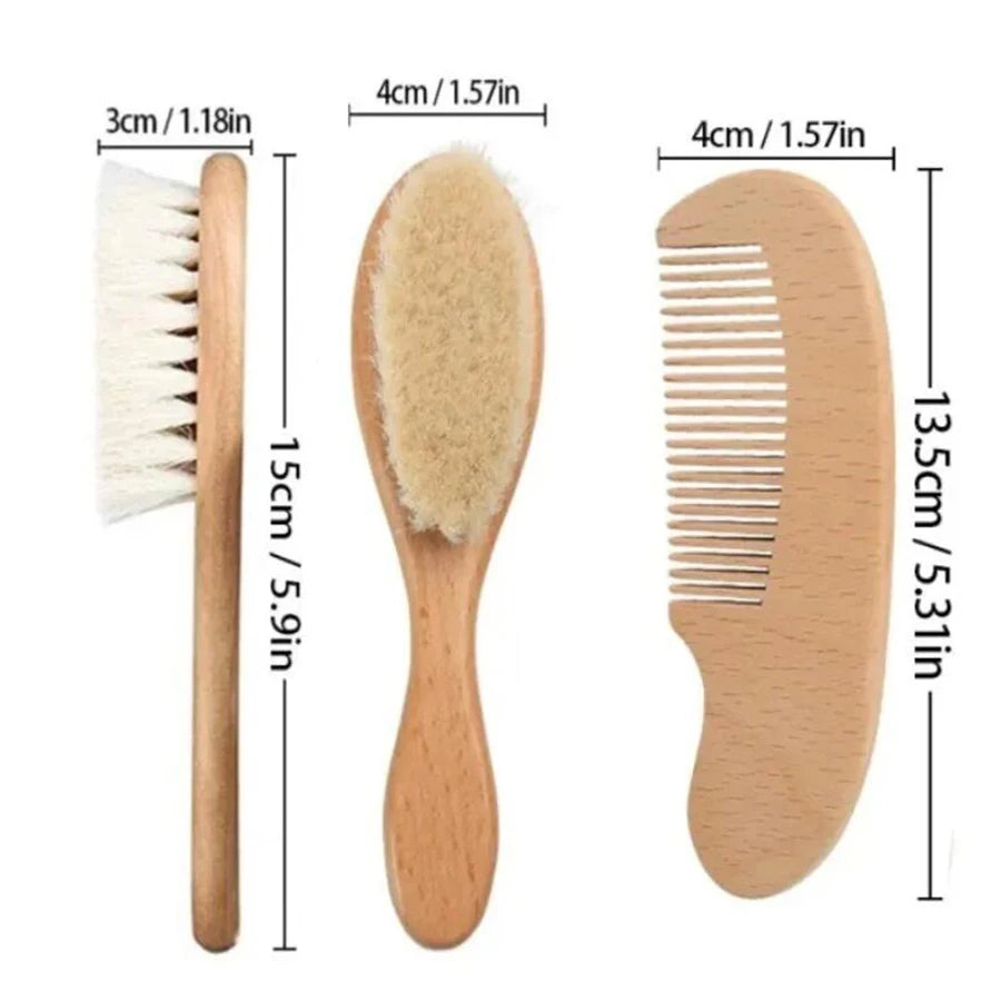 Wooden baby grooming set: two soft brushes and a wide-tooth comb for ages 0-36 months, about 13–15 cm long.