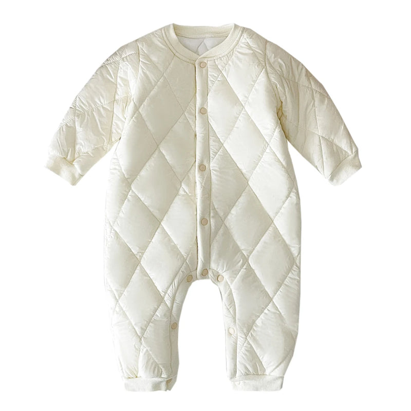 Soft and warm baby quilted romper in a crisp white color, perfect for layering and keeping your baby warm.