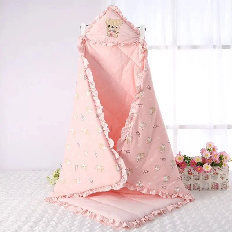 Infants Swaddle Wrap in a delightful pink shade, adorned with sweet animal illustrations for your little one.