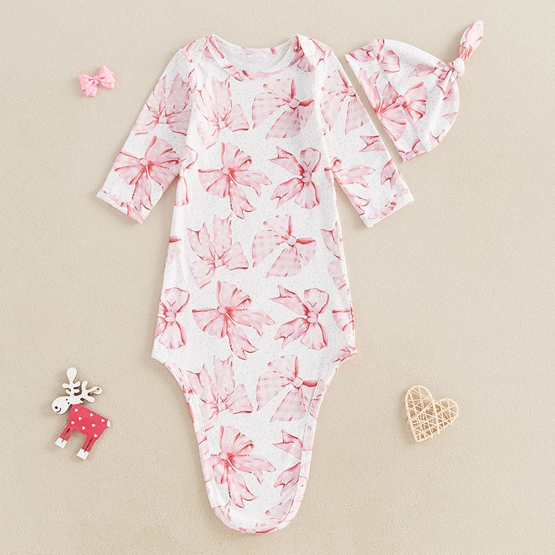 Baby Bows Knotted Infant Swaddle Gown 2 PC Set laid out with accessories, perfect for dressing up your little one.