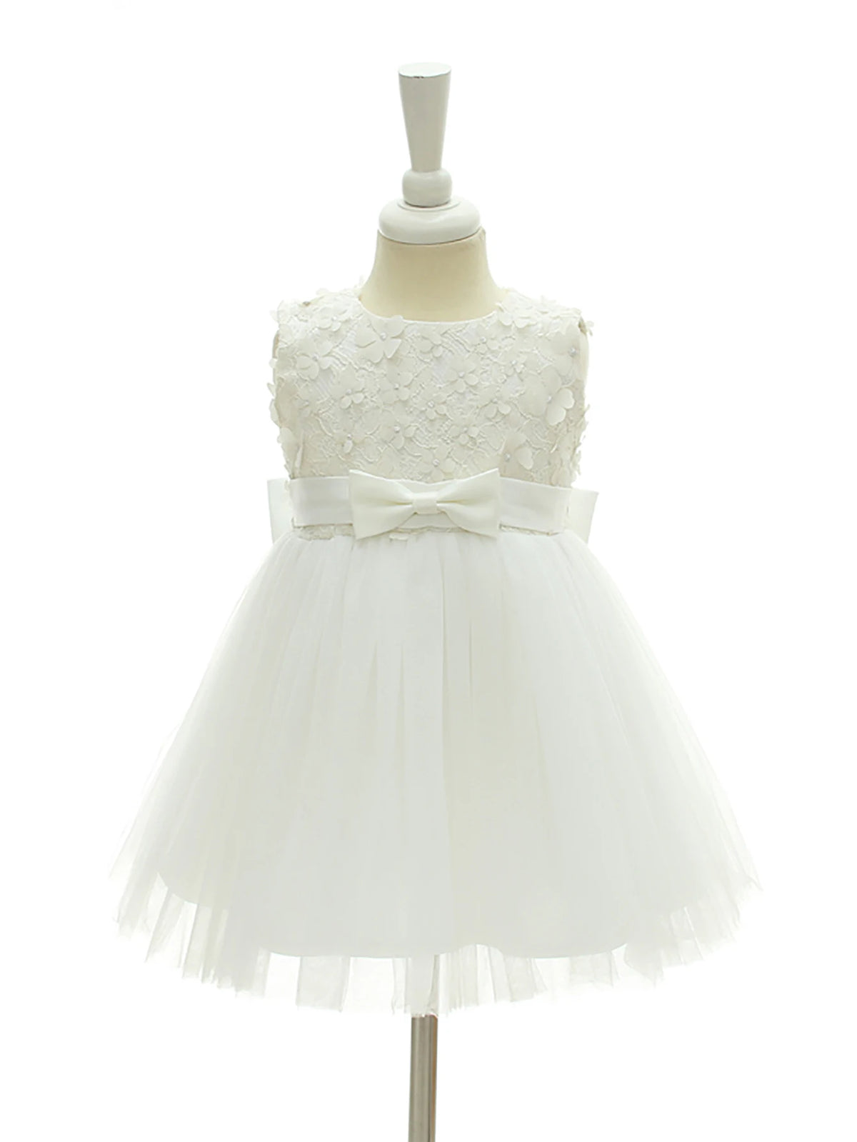 Adeline white tulle dress for girls with floral lace bodice and bow at the waist knee-length tulle skirt.