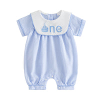 The adorable Sweet Birthday Wishes First Birthday Romper with Embroidered Bib showcases a cute cupcake design, ideal as a first birthday romper.