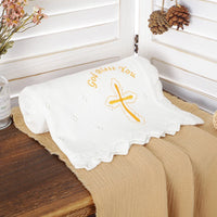 White cotton knit baby baptism and christening blanket with gold cross and God Bless You embroidery, scalloped edge