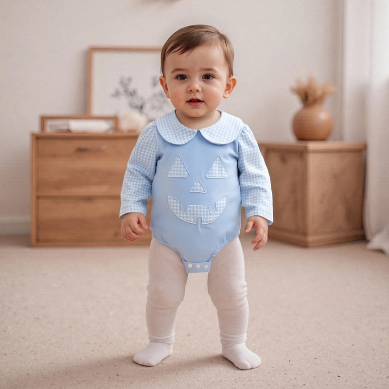 Little one wearing the "Peter Pumpkin" Adorable Baby Blue Romper with Snaps, smiling and ready for seasonal fun.