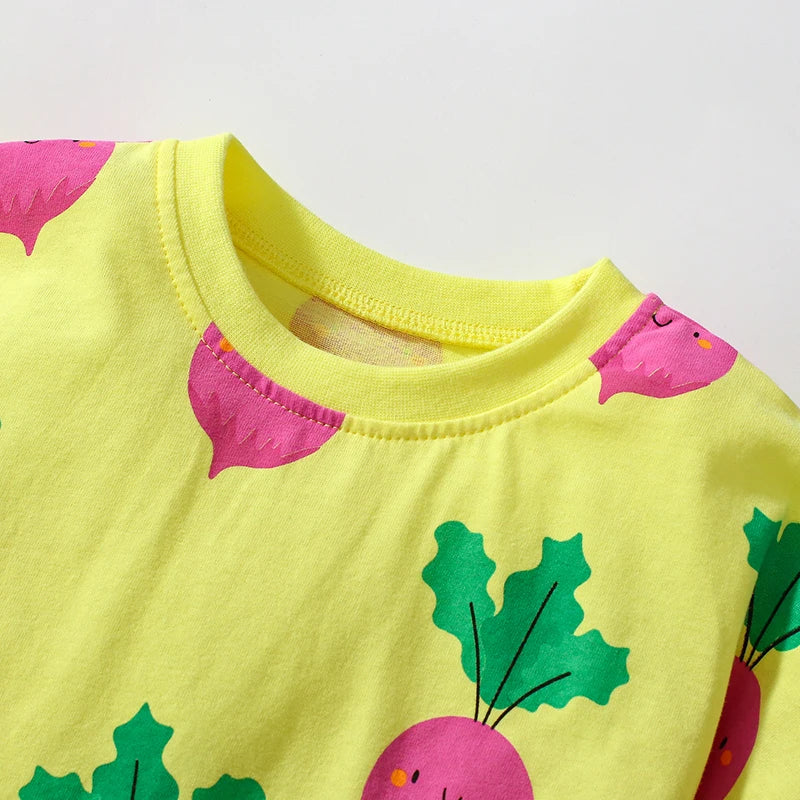 Close-up of the neckline on the Little Cutie fun print dress for girls in sunny yellow, showcasing the playful pink radishes design.