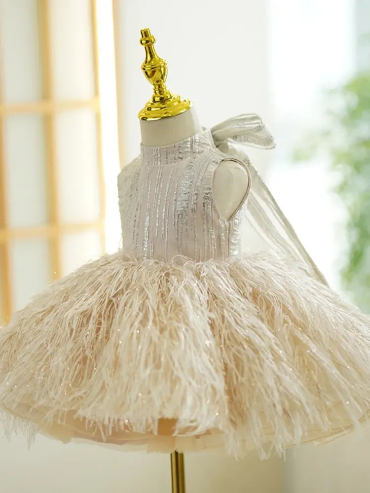 Back view of the "Bella" Lovely Special Occasion Dress in champagne with a lovely silver ribbon, designed to charm at formal occasions.