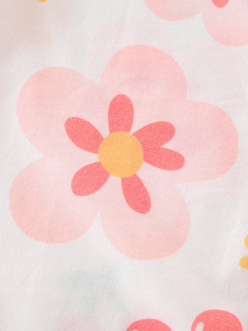 Detailed view of a pink flower design on the Floral Baby! Romper Outfit, perfect as a comfortable baby romper outfit for infants aged 1 month to 1 year.