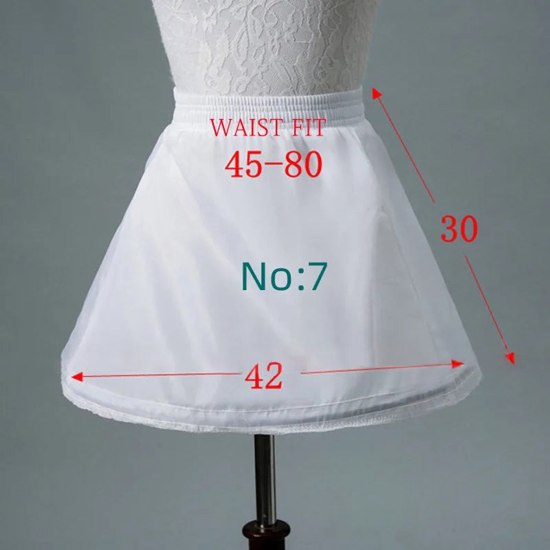 White children's petticoat crinoline underskirt on dress form; adds volume with 6 styles and lengths.