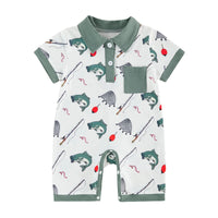 Polo-style short-sleeve boys romper with green collar and pocket, fishing and western-themed print.