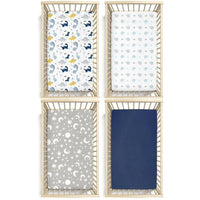 Four microfiber crib sheets for babies: dinosaur print, pale blue pattern, gray moon-and-stars, navy solid, 52x28 in.