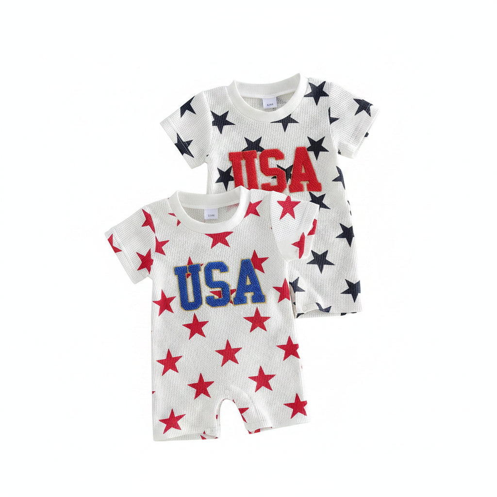 Two baby rompers with star and 'USA' designs on a beige background