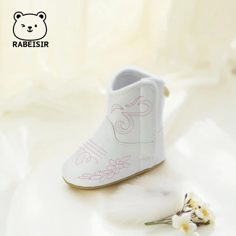 'Cowboy Kate' Anti-Slip Baby First Walker Boots angled view, featuring playful stitching and a fashionable look.