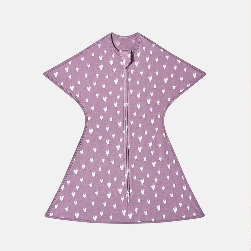 Light purple lightweight baby sleep sack adorned with white hearts, ideal for baby's peaceful slumber.