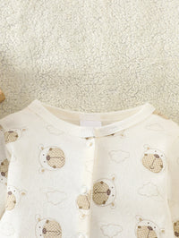 Little Bear beige 8-piece newborn romper set, 100% cotton; cream fabric with bear prints and front snaps.