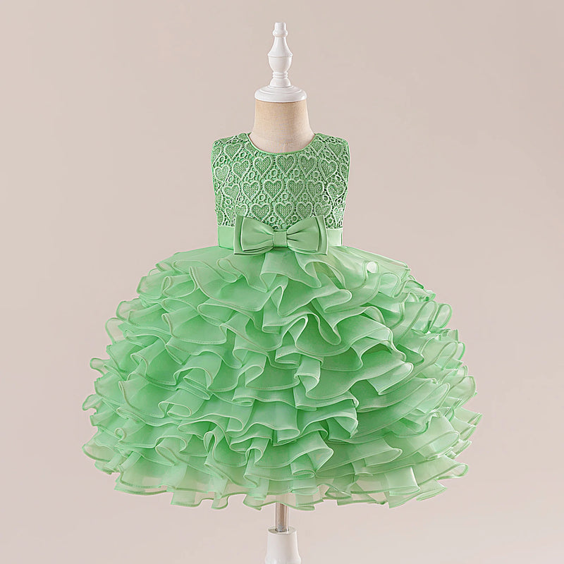 Chic green 'Evengaline' Tulle Tiered Dress for Girls with playful ruffles and a delicate bow, perfect for making an impression.