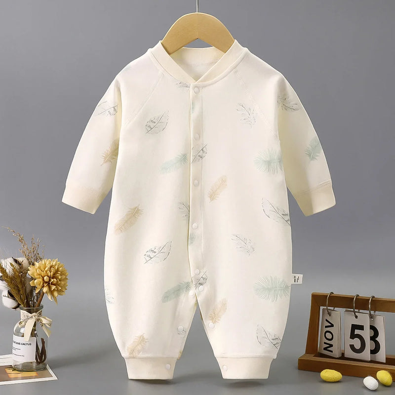 Sweet Pastels Baby's Romper in soft cotton with nature-inspired pastel leaves pattern, ideal for infants aged 6 to 18 months.