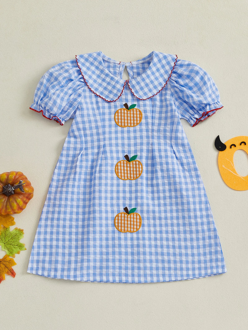 Front view of the Adorable Pumpkins and Checks Girls Dress showcasing a Peter Pan collar and cute puff sleeves, adorned with embroidered pumpkins.
