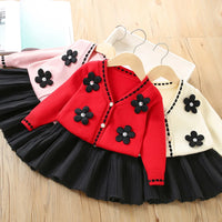 Three-color Vanessa floral knitted cardigan with pleated skirt set for girls, featuring flower appliques.