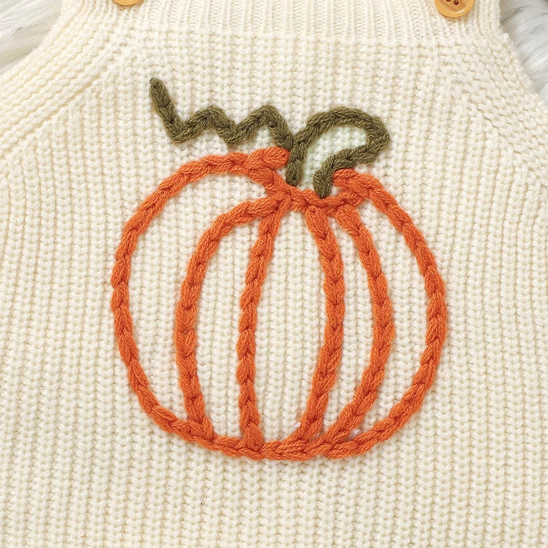 Close-up of Pumpkin Embroidered Overalls Knit Baby Outfit - Details of the embroidered pumpkin on this stylish knit baby outfit.