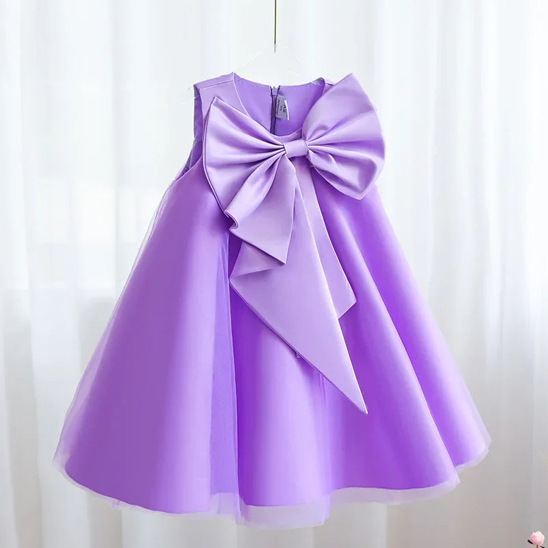 Sari-Elle Elegant Party Dress With Large Bow in lavender, A-line for girls 4–6, perfect for parties.