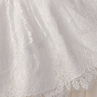 Tabitha Elegant Baptism Flower Girl Dress fabric: white lace with delicate floral pattern.