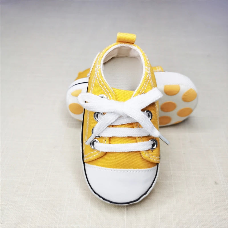 Close-up of Baby's Canvas Lace-up First Walkers - Florida Sunshine, highlighting the secure lace-up design for young explorers.