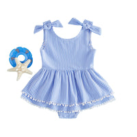 Blue and white seersucker stripe romper swimsuit for babies to toddlers with bow shoulders and tassel trim.