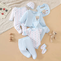 Light-blue 8-piece 100% cotton baby layette with star-print bodysuits, bib, cap, mittens, and romper