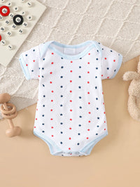 Star-print white baby bodysuit with red and blue stars and light-blue trim.