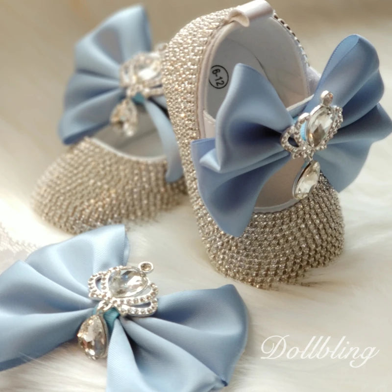 Luxurious Rhinestone Crown Shoes & Headpiece Set showcasing elegant blue satin bows and exquisite rhinestone details, ideal for little girls' fashionable moments.