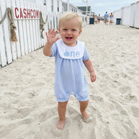 Charming Sweet Birthday Wishes First Birthday Romper with Embroidered Bib, featuring classic Boca blue stripes, perfect first birthday romper for your little one.