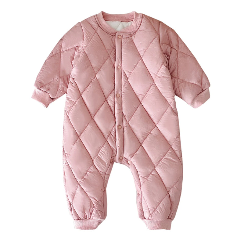 Adorable pink baby quilted romper featuring a cozy look, ideal for fall and winter styles for little ones.