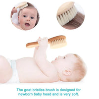 Wooden baby brush with soft bristles and rounded handle for newborns to toddlers; gentle grooming.