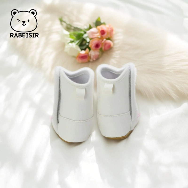 'Cowboy Kate' Anti-Slip Baby First Walker Boots viewed from behind, emphasizing the stylish and practical design.