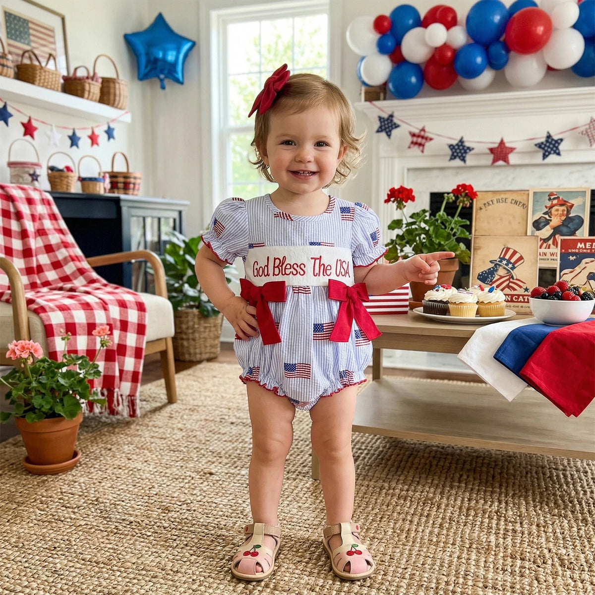 'Anna' American Flag Seersucker Romper with Adorable Bows and Headband - The Palm Beach Baby Estimated 12 - 18 Day Shipping