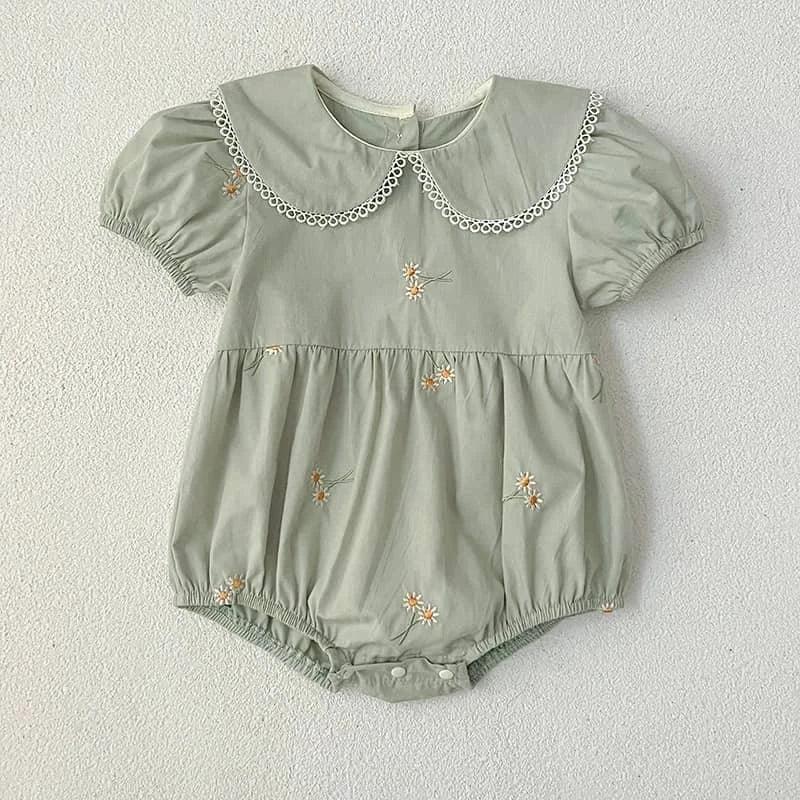 Light green embroidered baby bubble romper with lace collar and floral details for infants