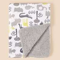 Lightweight ultra-soft children's micro-plush reversible blanket with 4 colorful animal prints and sherpa reverse.