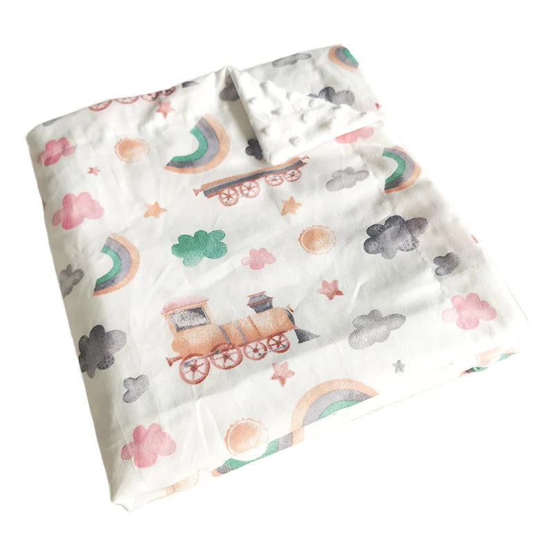 Dotted Minky Blanket in Colorful Prints, 100 x 75 cm; lightweight polyester/cotton with trains, rainbows, clouds.