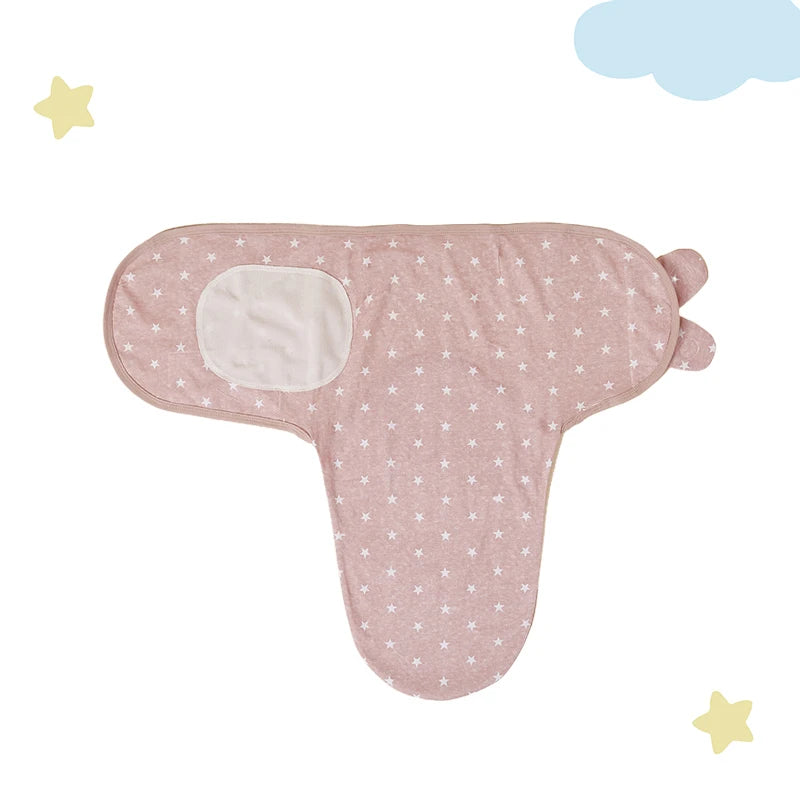 Cozy Baby Swaddle showing the inside view with a soft pink color and adorable star design, ensuring a snug fit.