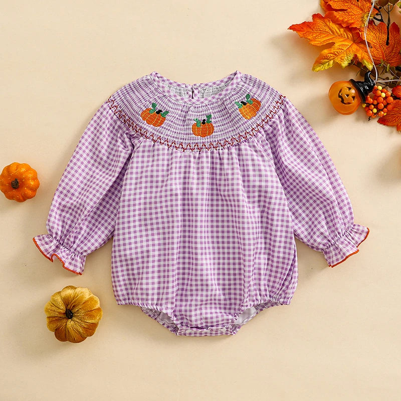 Holiday Cuteness Smocked Baby Bubbles in lavender gingham featuring pumpkin details, ideal for holiday celebrations.