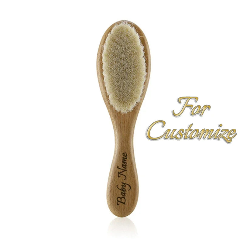 Personalized wooden baby brush for infants and toddlers with engraved name.