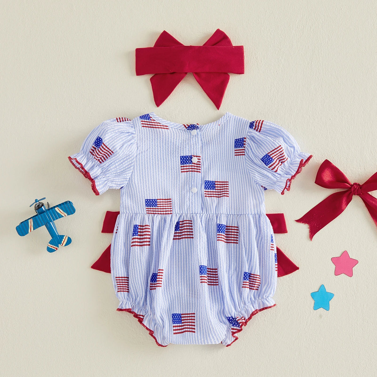 'Anna' American Flag Seersucker Romper with Adorable Bows and Headband - The Palm Beach Baby Estimated 12 - 18 Day Shipping