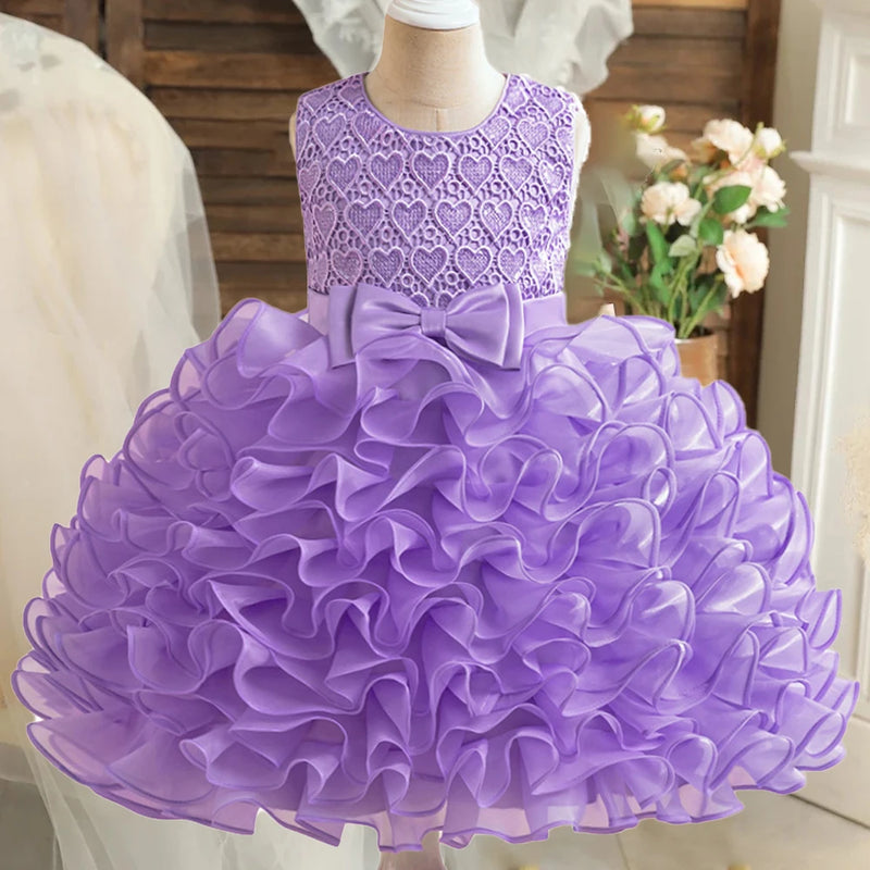Vibrant purple 'Evengaline' Tulle Tiered Dress for Girls, featuring a stylish bow and ruffled skirt, great for any special event.