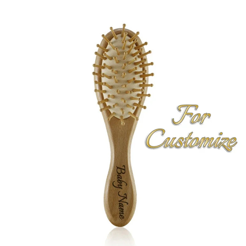 Personalized wooden baby brush with custom name on handle, for infants and toddlers ages 0-36 months.