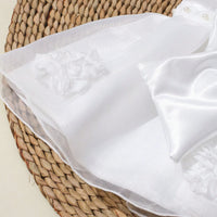 Lara Elegant infant dress set: white beaded headband, big bow, tulle overskirt, back zip, newborn–3 months.