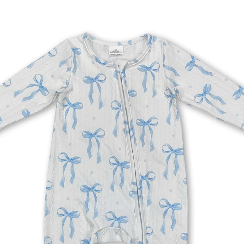 Close-up of the Little Blue Bow zippered long sleeve romper in soft blue, showcasing its playful design and easy zipper front.