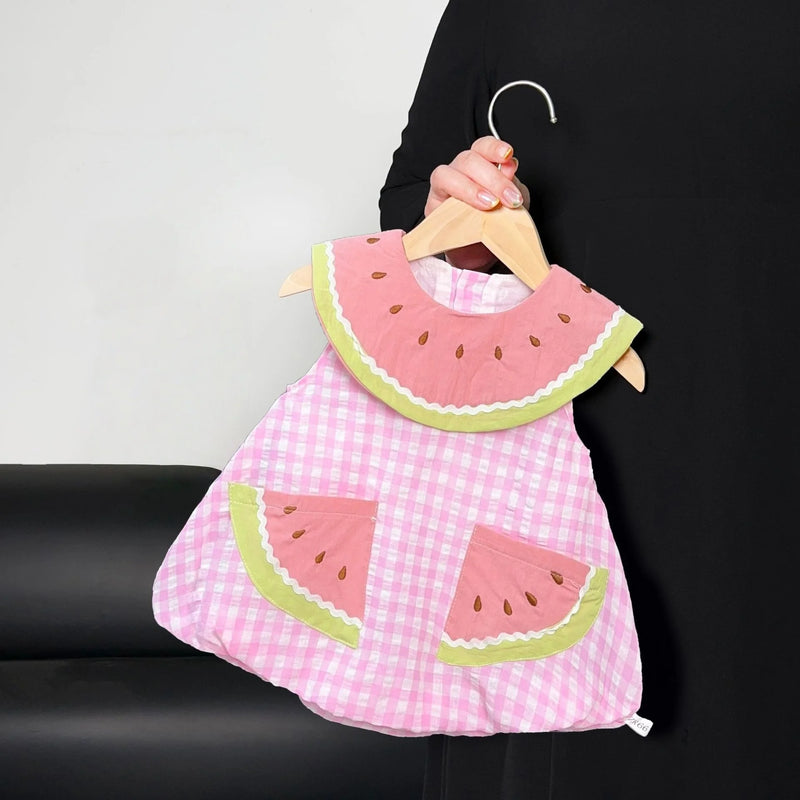 Adorable 'Watermelon-licious' Party Romper Dress featuring a pink and white check pattern with a watermelon-print collar and playful pockets, perfect for summer outfits for toddlers.