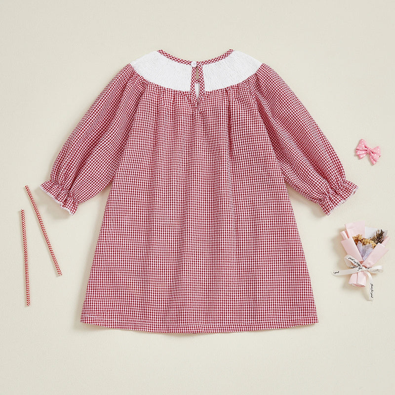 Back view of the Merry Christmas, Ducky! Checked Smocked Dress showcasing the checked pattern and button closure, perfect for holiday celebrations.
